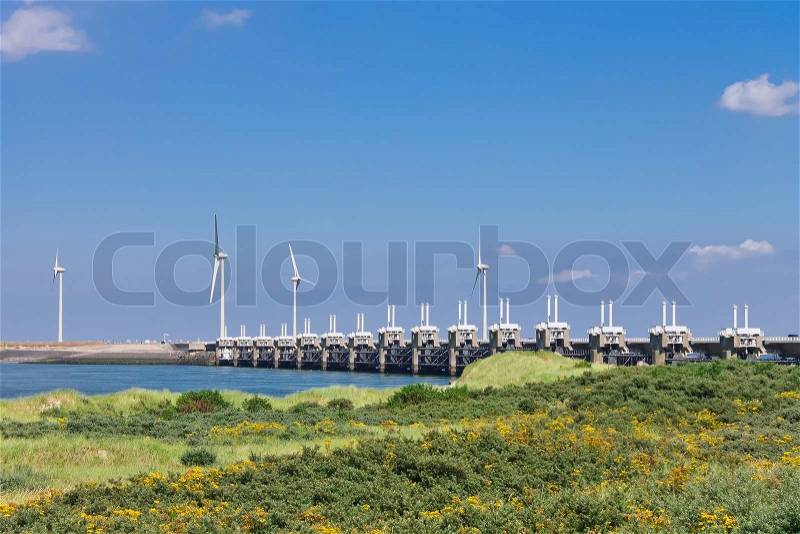 Wind turbines near the storm barrier Netherlands, stock photo