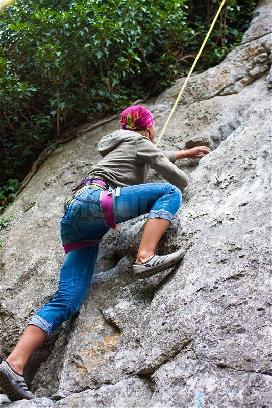 Young female climber, stock photo