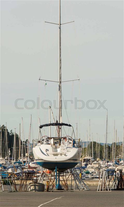Sailboat in dry dock on jack stands, stock photo