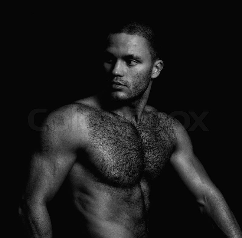 Portrait of a handsome naked muscular guy Black and white, stock photo
