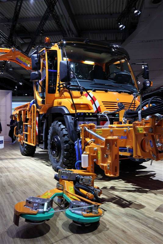 HANNOVER - SEP 20: New Mercedes Benz Unimog Road Cleaning Truck at the International Motor Show for Commercial Vehicles on September 20, 2012 in Hannover Germany, stock photo