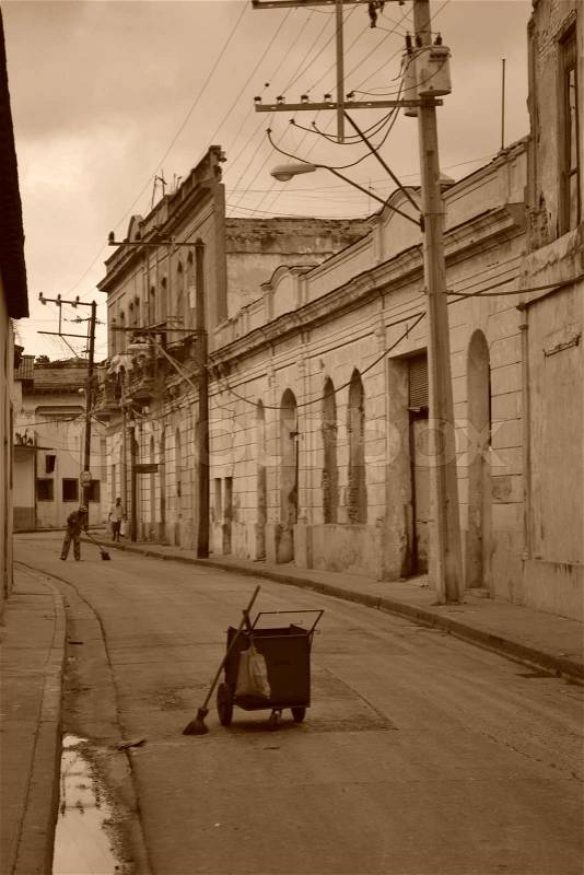 Garbage man in Cuba, stock photo