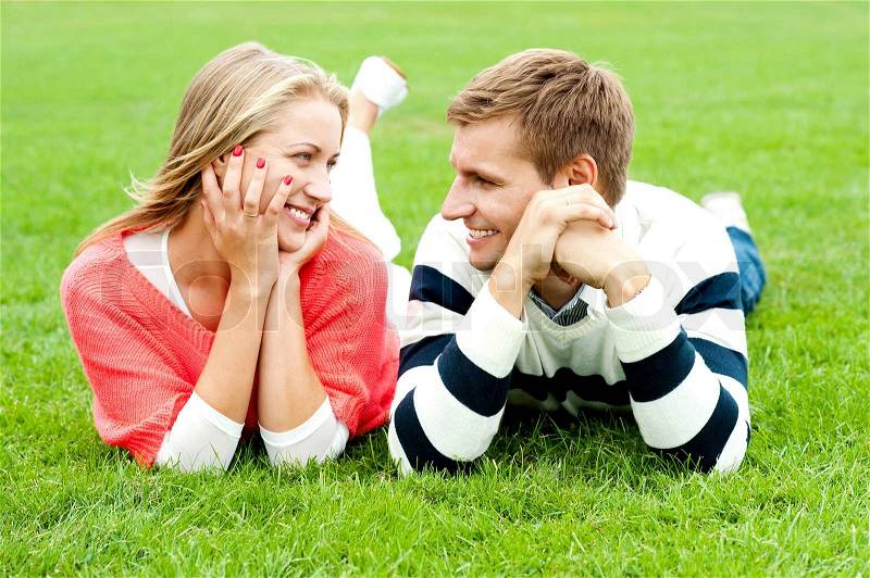 Admiring love couple lost in each other, stock photo