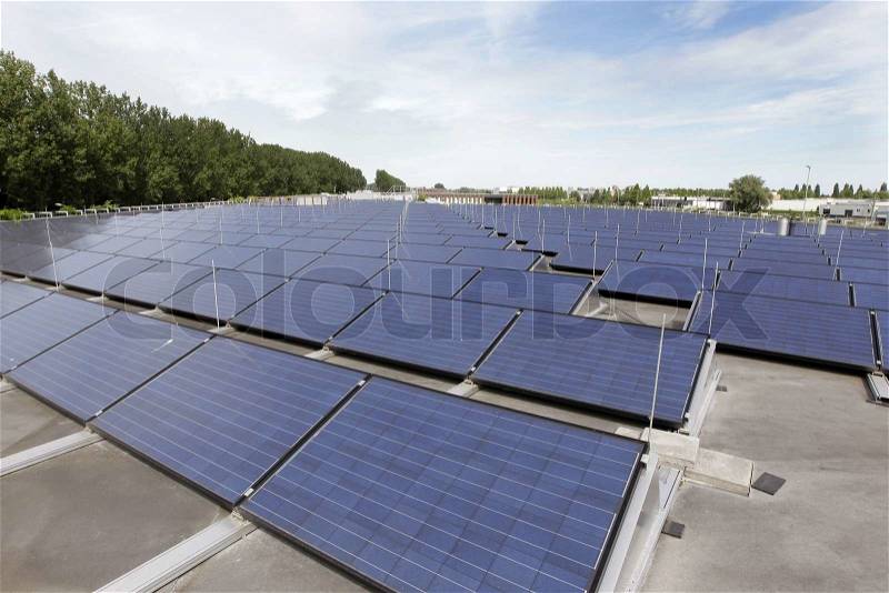 Company roof with solar panels, stock photo