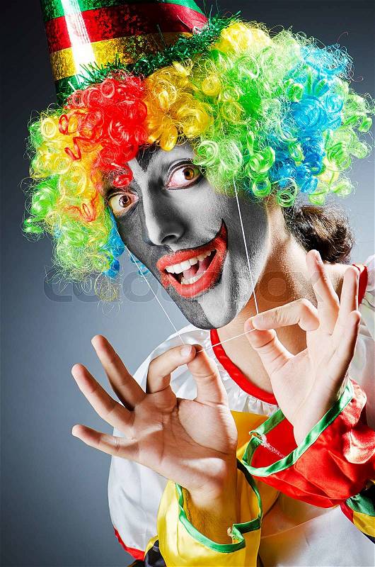 Funny clown in studio shooting, stock photo