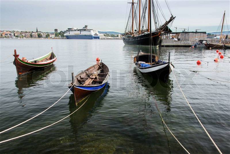Wooden boats in Fjord, stock photo