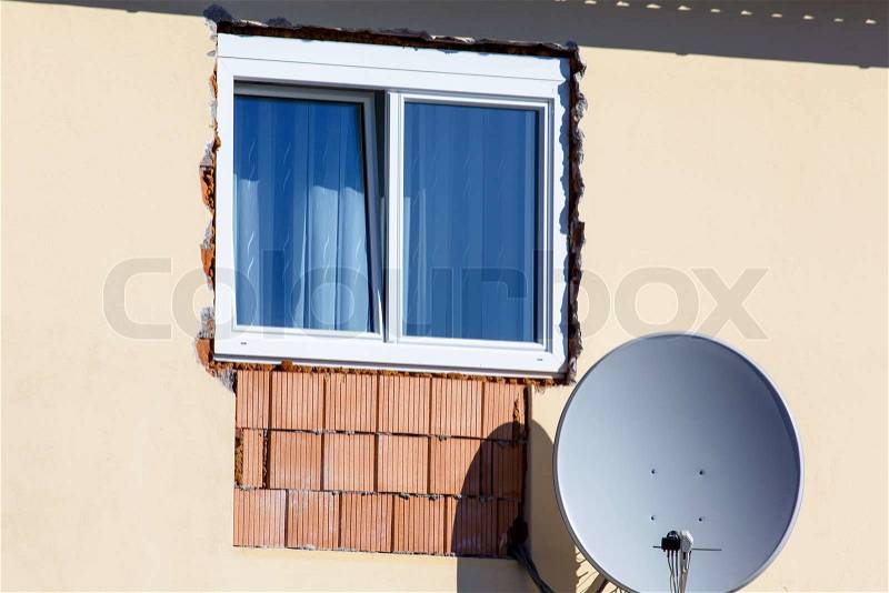 New window with satellite dish, stock photo
