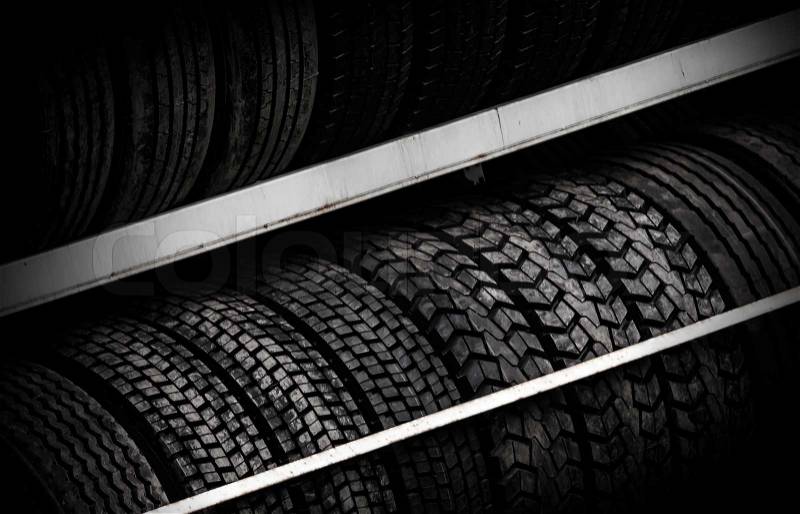 Row of car tires on the counter, stock photo
