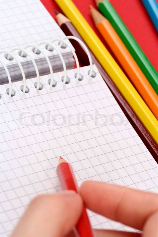 Pencil and agenda, stock photo