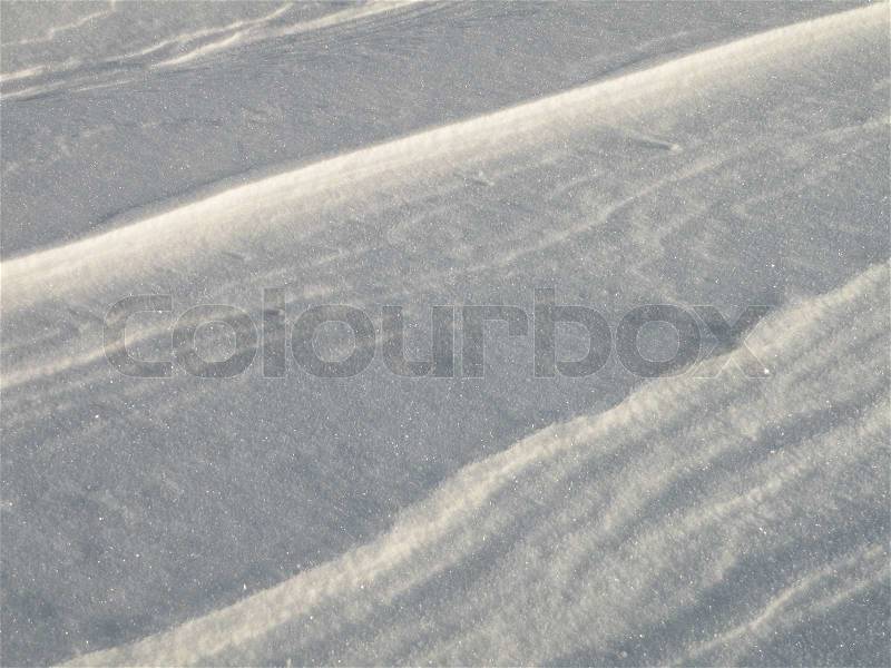 Close up of snow covering the surface with pattern, stock photo