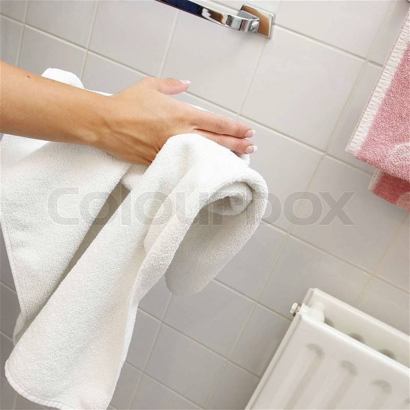 Drying hands with a towel, stock photo
