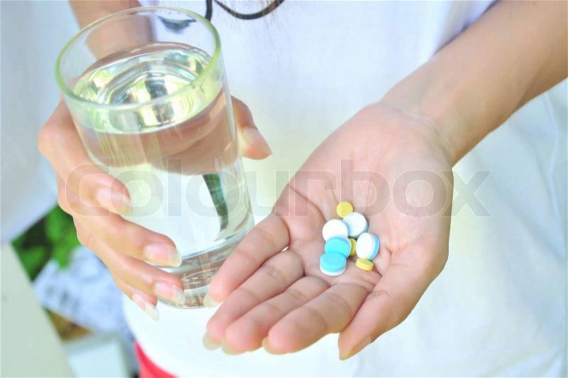 Take medicine and water, stock photo