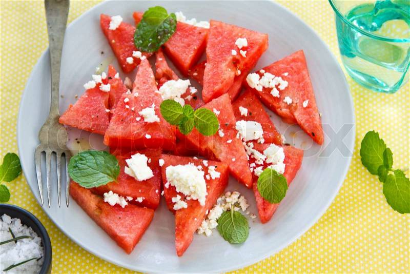 Watermelon with Feta cheese and mint salad, stock photo