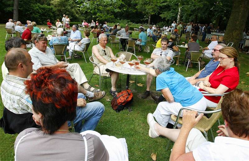 People in the park drinking beer, stock photo