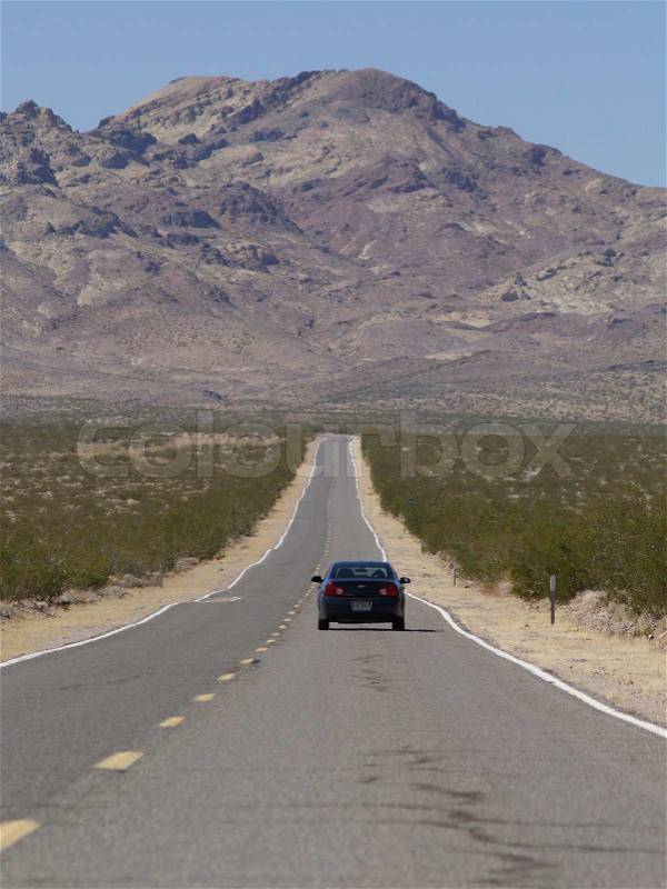 Car with the famous Route 66 sign, stock photo