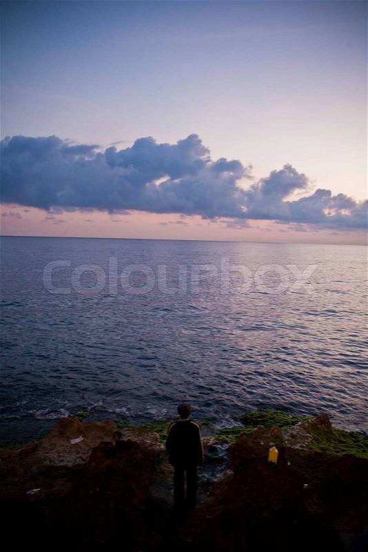 El momento para contemplar la vida y el mar, stock photo