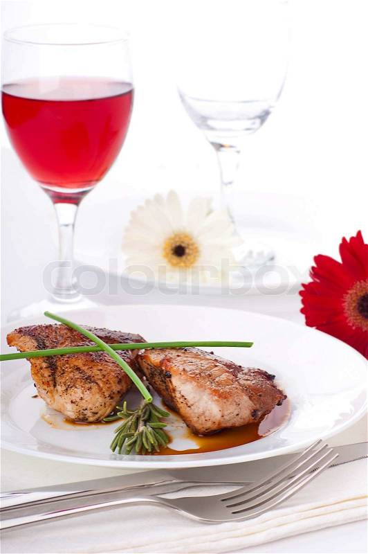 Raw meat, wine and spices on a wooden board, stock photo