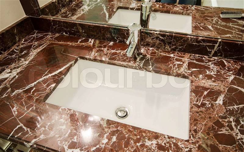 Sink in marble stand, stock photo
