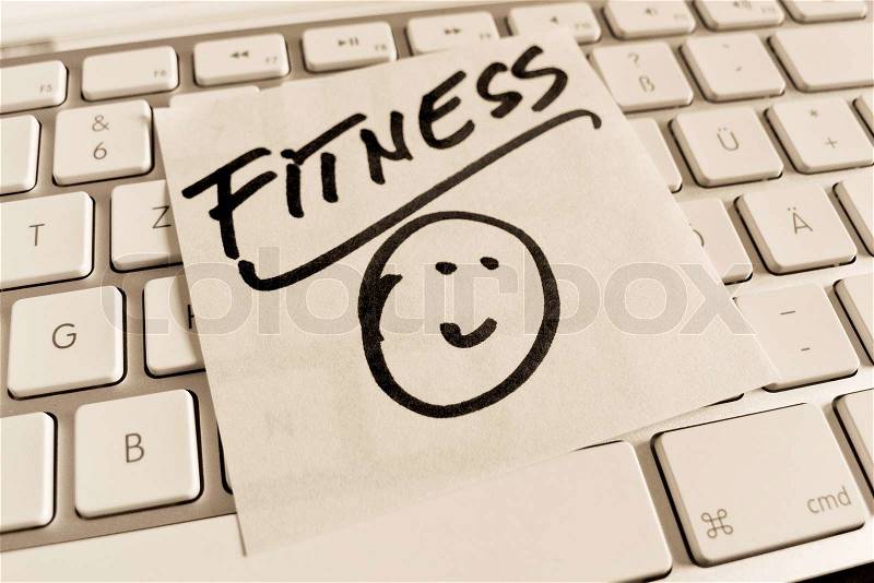 Note on computer keyboard: fitness, stock photo