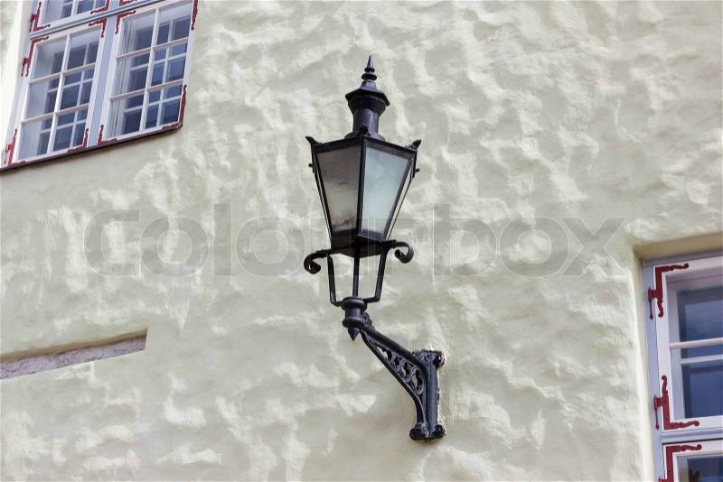 Street lamp on the wall, stock photo