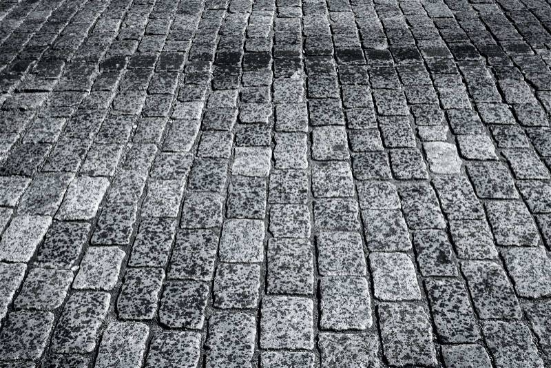 Wet stone paved avenue street roa, stock photo