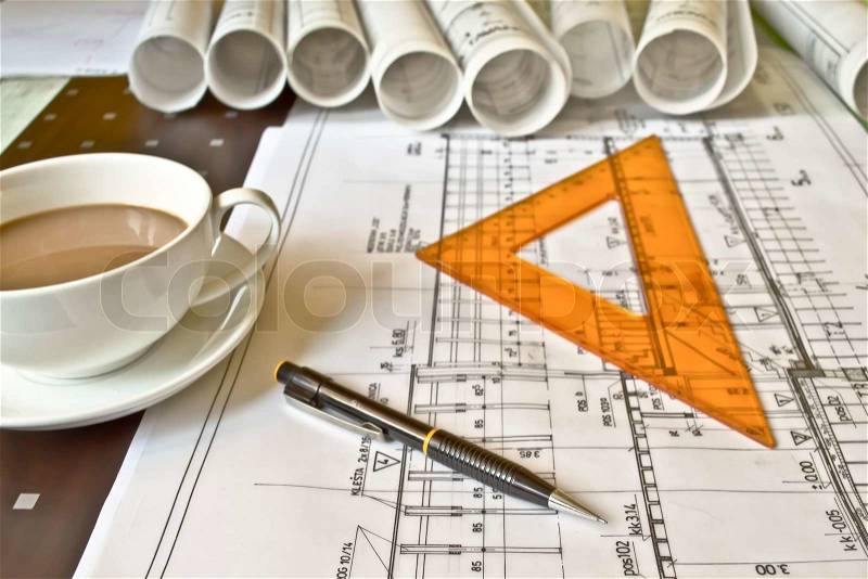 Heap of architect design and project drawings on table background, stock photo