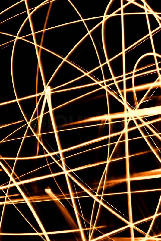 Abstract chaos fire rays on dark background, stock photo