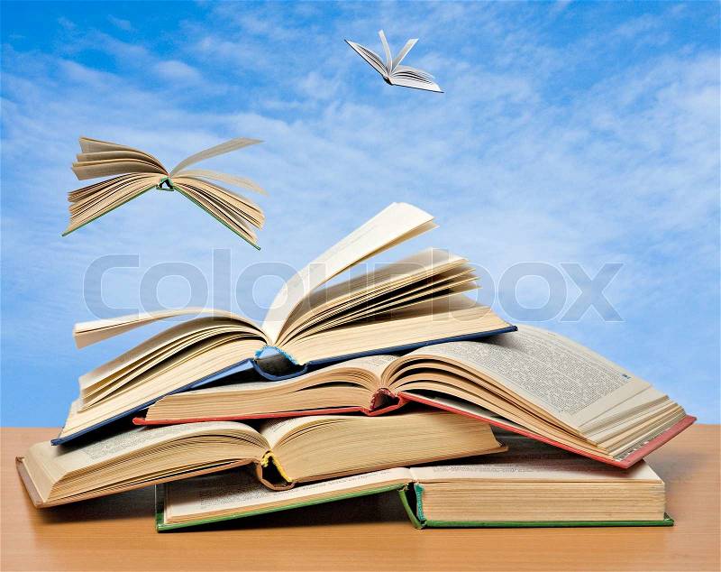 Flying books, stock photo
