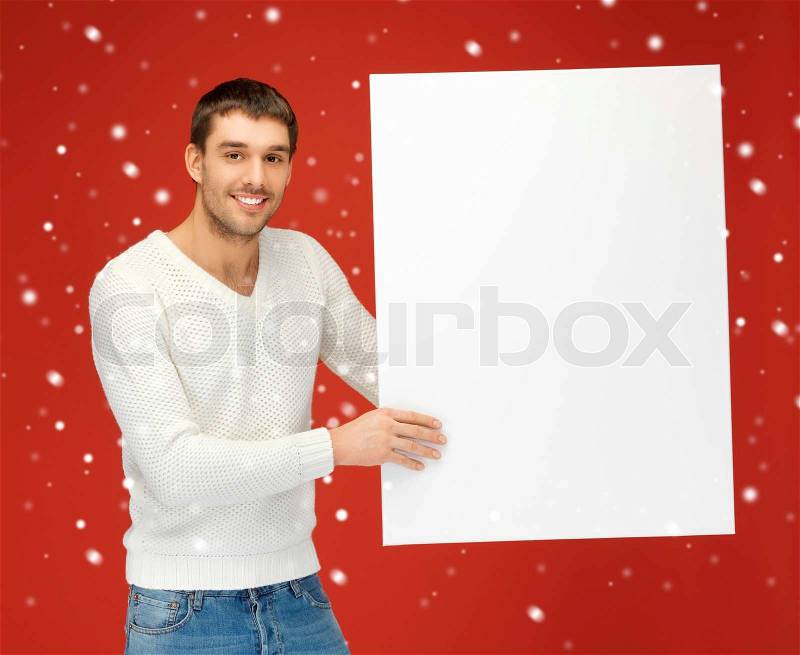 Bright picture of handsome man with big blank board, stock photo