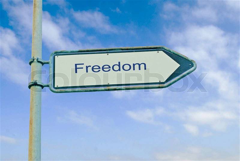Road sign to freedom, stock photo