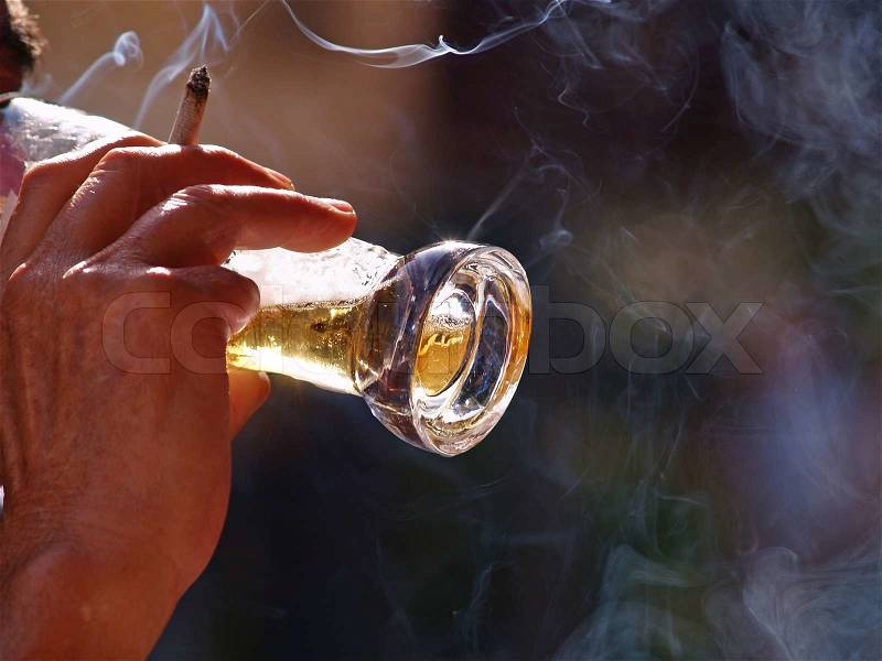 Drinking beer and smoking cigarettes, stock photo