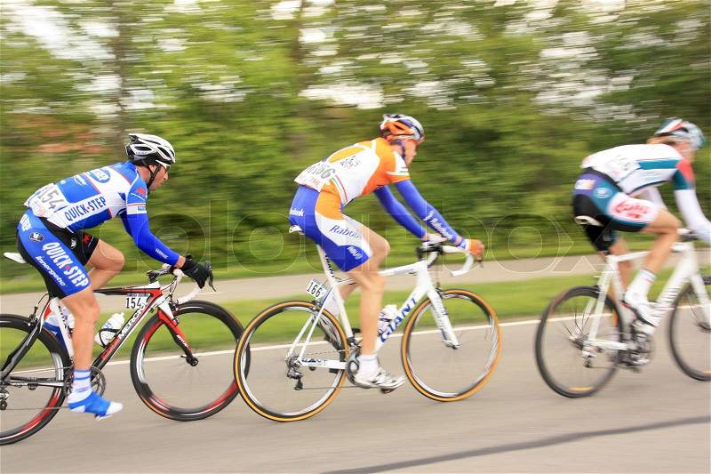 Giro d' Italia, the leading group, the three cyclists in full speed, in Holland in the summer, stock photo