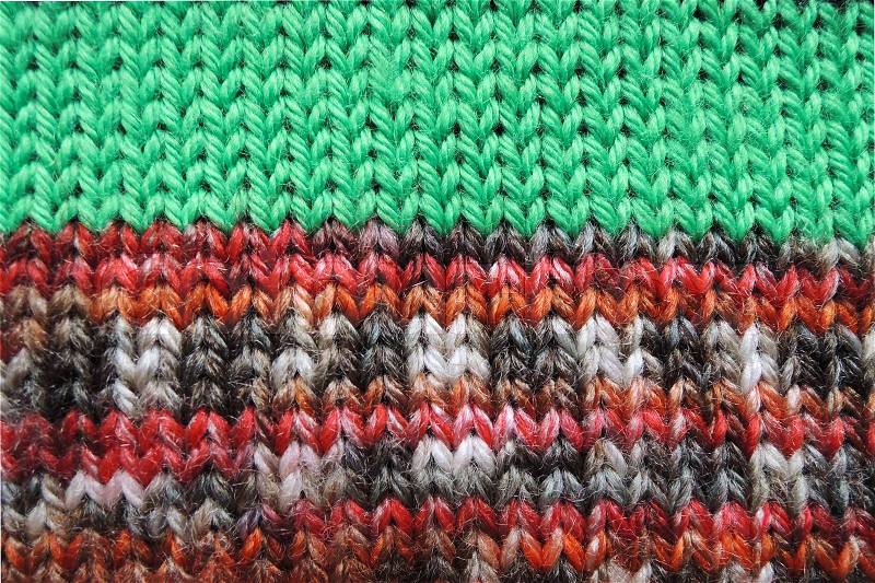Knitted fabric - macro of a woolen texture, stock photo