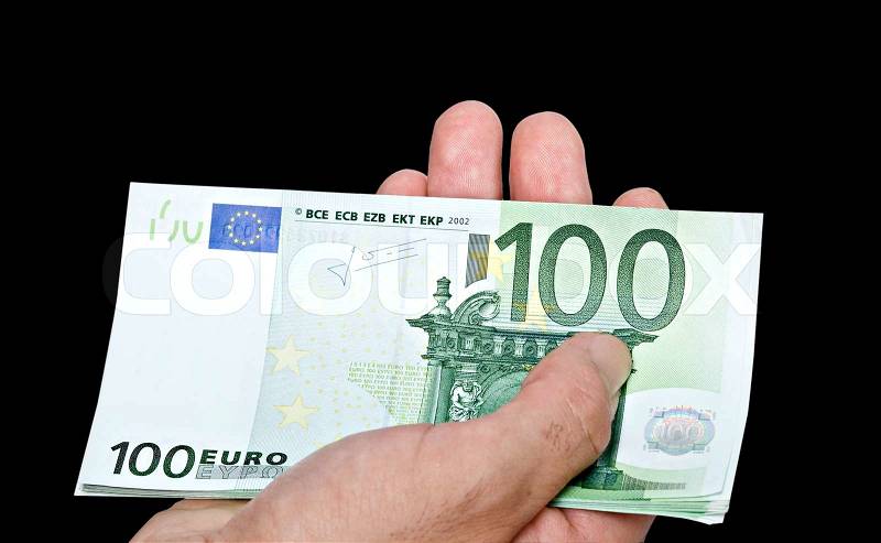 Euro banknotes in hand, stock photo