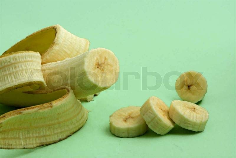Banana and its slices isolated on background, stock photo
