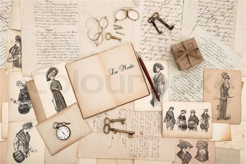 Antique accessories, old letters and fashion drawings, stock photo