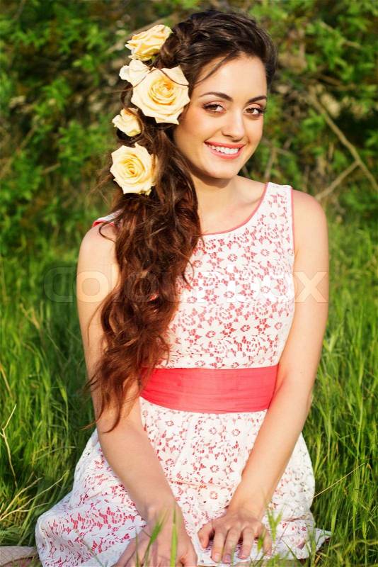 Beautiful womanwith flowers in her hair, stock photo