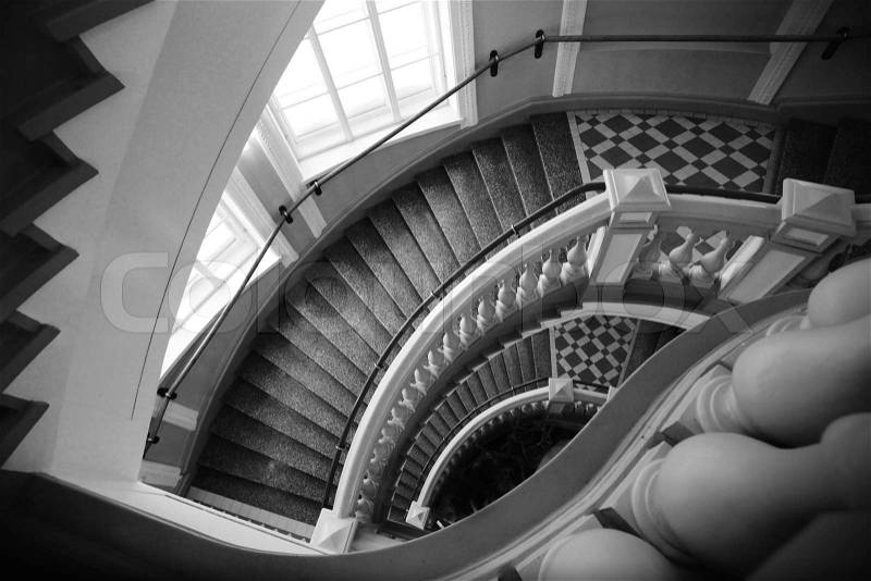 Spiral stairs with balusters Abstract classical architecture dark interior monochrome fragment, stock photo