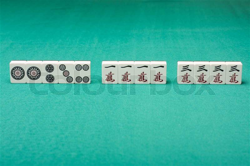Smooth table surface with a mahjong on it, stock photo