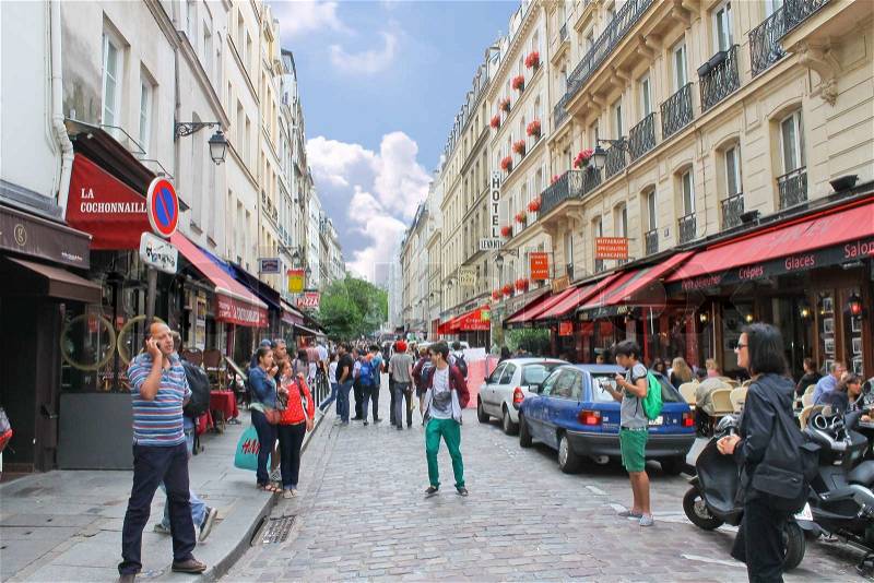 People on the streets of Paris France, stock photo