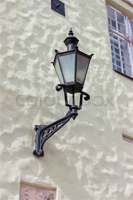 Street lamp on the wall background, stock photo