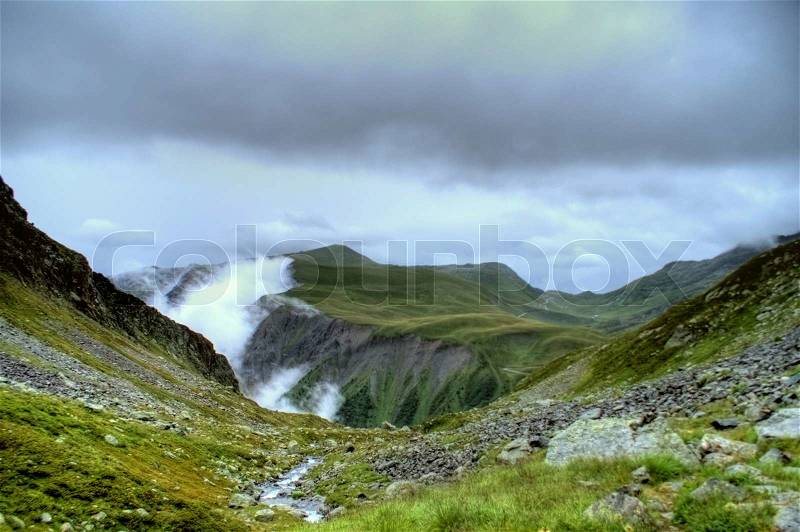 Hiking path for health and tourism in alpesmountainsin summer, stock photo