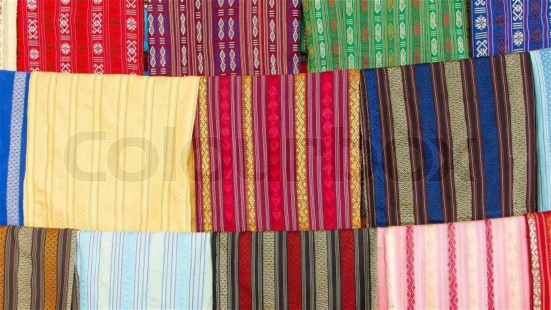 Silk scarfs on display in a silk factory, stock photo