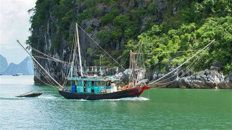 Fishing boat in the Ha Long Bay, stock photo