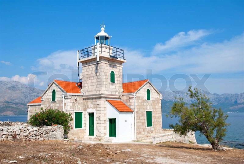 Stone Lighthouse on the Island of Hvar in Croatia, stock photo