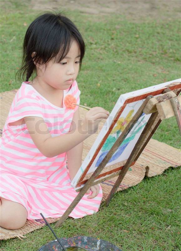 Asian young girl painting, stock photo