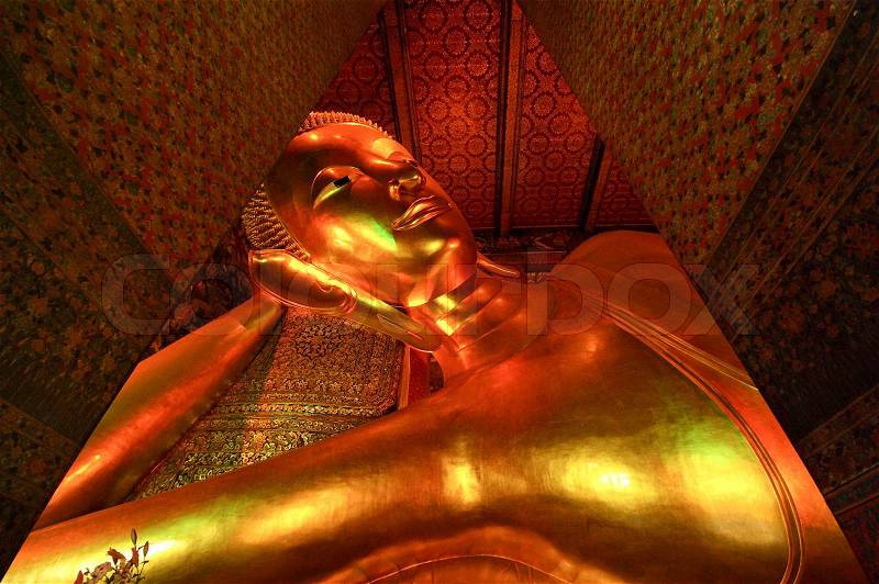 Reclining Buddha statue in Thailand Buddha Temple Wat Pho , Asian style Buddha Art, stock photo