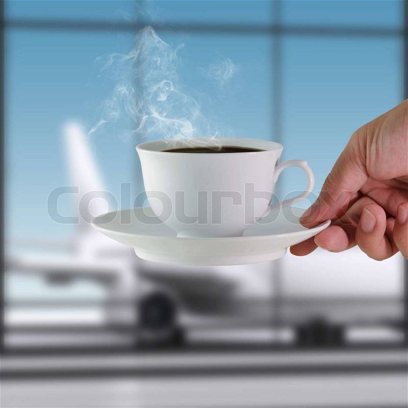 Coffee cup at the airport, stock photo