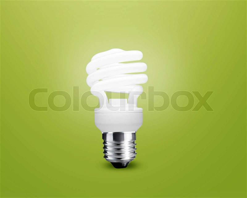 Glowing Light bulb idea on green background, stock photo