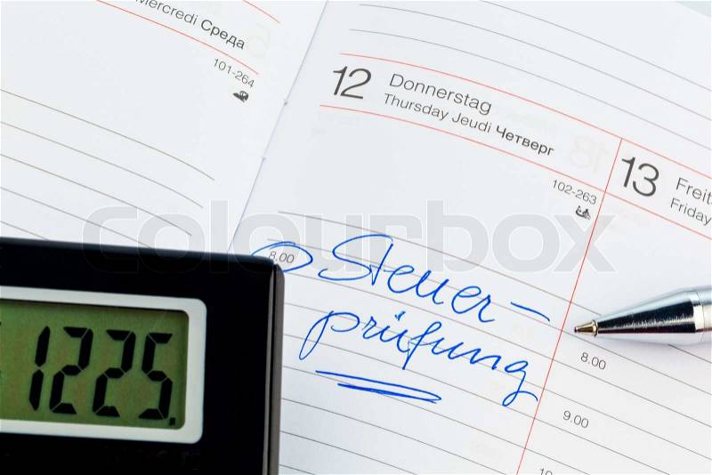 Entry in the calendar: tax audit, stock photo